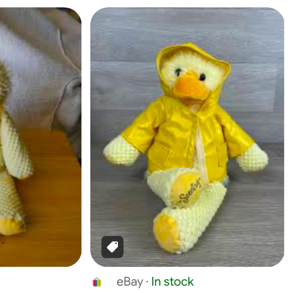 Scentsy Wellington the duck with raincoat. Brand new in box